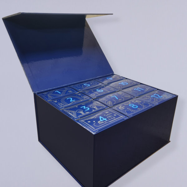 Bespoke luxury rigid box advent calendar with 12 custom pull-out drawer boxes showing smooth gloss laminated finish and premium construction for corporate gifting
