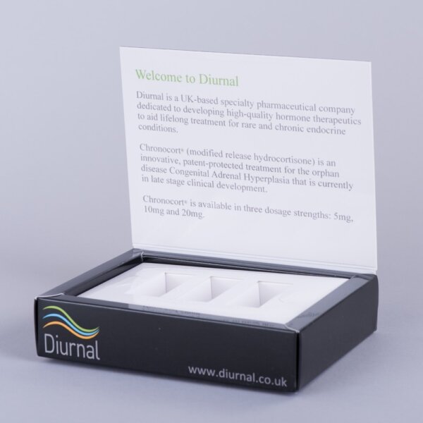 Hinged lid promotional box with board plinth holding three vials litho printed gloss laminated, UK manufactured by Create-This Ltd