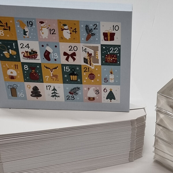 Self-fill advent calendar with recyclable vacuum-formed tray for corporate branding, Create-This Ltd