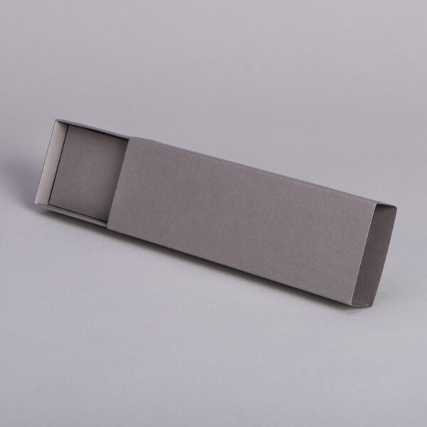 Custom sliding box for pencils in coloured material with foil-blocked logo for retail packaging, UK manufactured by Create-This Ltd
