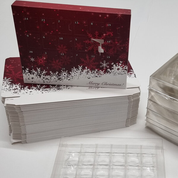 Self-fill advent calendar with eco-friendly tray for corporate seasonal campaigns, - red design UK manufactured by Create-This