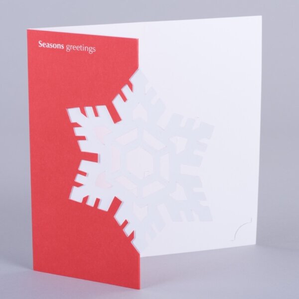 Snowflake shaped Christmas card die-cut litho printed for seasonal brand campaigns, UK manufactured by Create-This Ltd